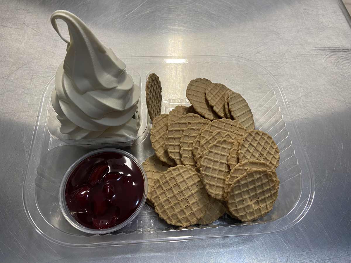 Soft serve with chocolate syrup and waffle chips from Stillwater Ice Cream